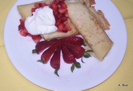 crepes strawberries whipped cream   
